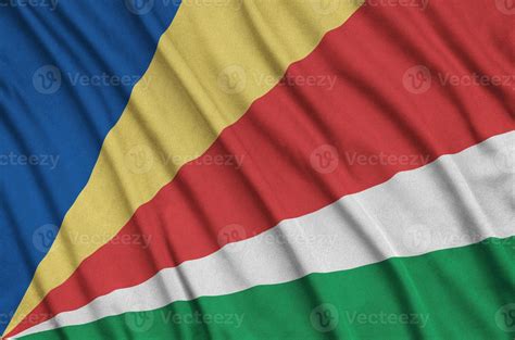 Seychelles Flag Is Depicted On A Sports Cloth Fabric With Many Folds