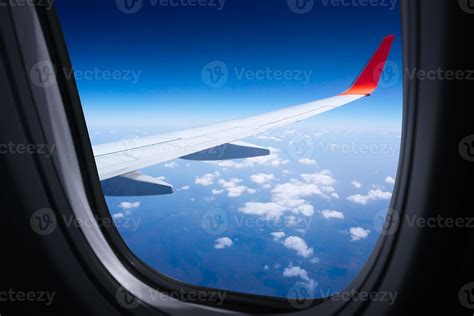 Wing airplane with blue sky and clouds from window,Beautiful blue sky ...