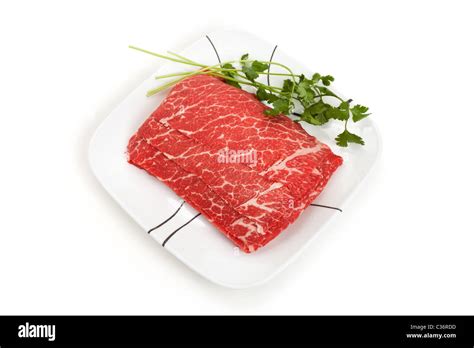 Beef Slices Cooked In Hot Pot Stock Photo Alamy