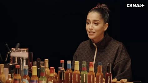 The zipped tracksuit jacket worn by Leïla Bekhti in the show Hot Ones Spotern