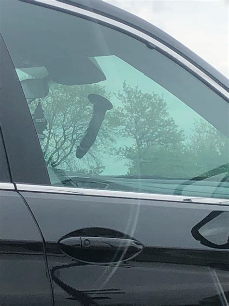Interesting phone-dashcam-gps mount - driver was mid to late 20s woman