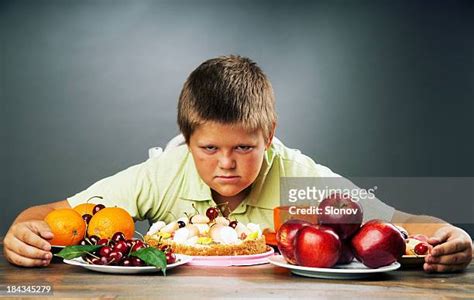 Fat Person Eating Cake Photos and Premium High Res Pictures - Getty Images