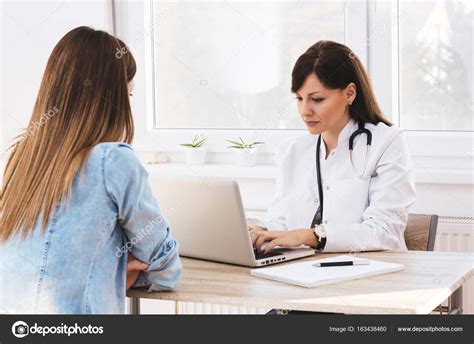 Girl Having Consultation With Doctor Stock Photo By ©bnenin 163438460