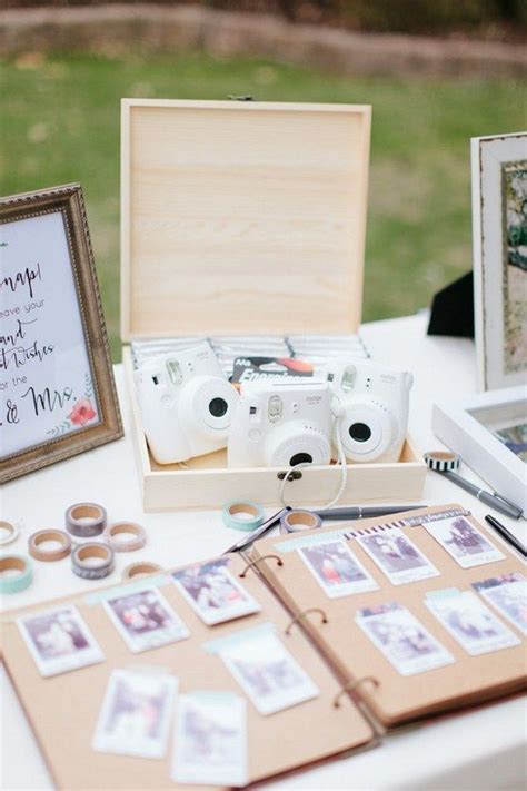 A Table Topped With Pictures And Photos Next To A Wooden Box Filled