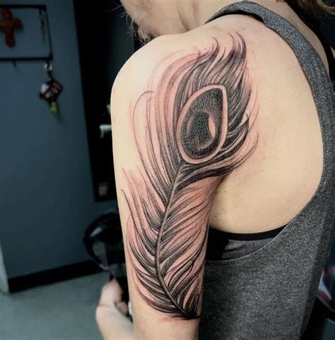 Black And White Peacock Feather Tattoo