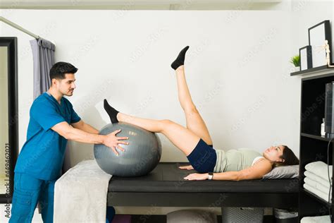 Side view of a patient doing rehabilitation exercises Stock Photo ...