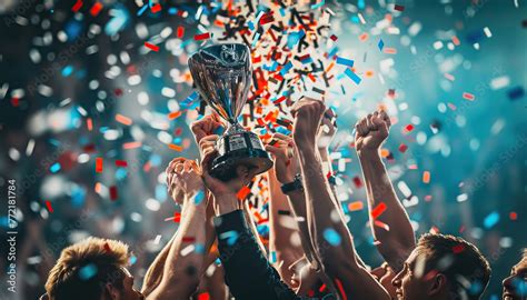 team celebrating   championship trophy  winning  big