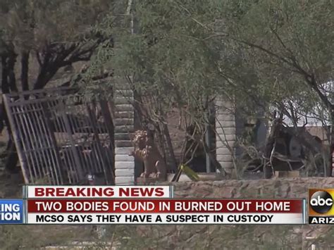 Man Arrested After Bodies Found In Burned Home