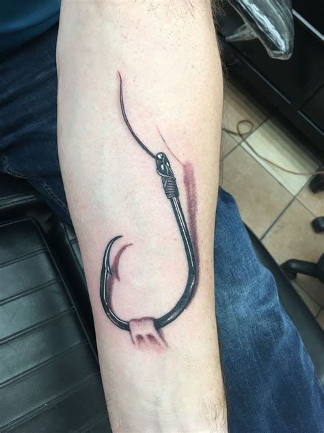simple fishing tattoo 1