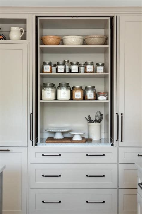 Gray Kitchen Pantry Cabinets With Folding Doors Transitional Kitchen