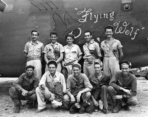 Crew poses with their B-24 Liberator "Flying Wolf" 42-41091 of the 43rd ...