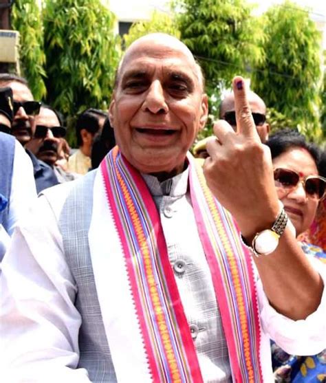 Defence Minister And Bjp Candidate Rajnath Singh Shows His Inked Finger