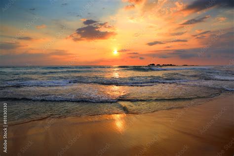 landscape with sea sunset on beach Stock Photo | Adobe Stock