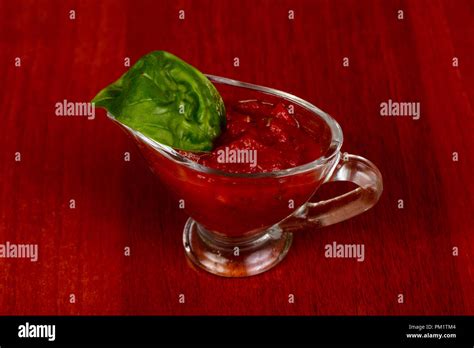 Hot Spicy Sauce Served Basil Leaves Stock Photo Alamy