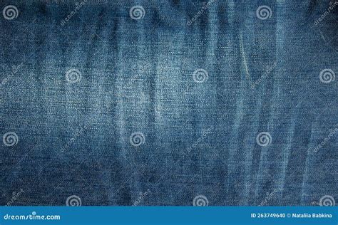 Fondo De Denim Azul Textura De Los Vaqueros Rasgados Foto De Archivo