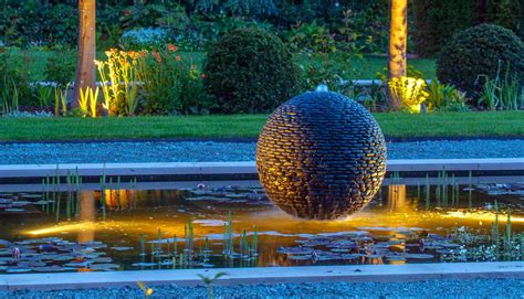 Stone Sphere Water Feature | Water Fountain Ball of Black Pebbles