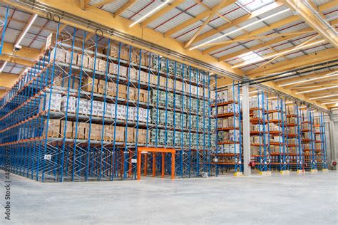 Interior View Of A Warehouse With Racks Pallets Goods Forklifts