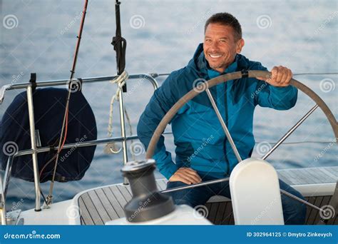 Smiling Mature Man Sailing A Ship Stock Image Image Of Goodlooking Happiness 302964125