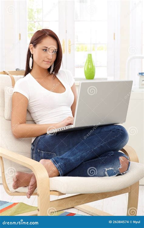 Young Woman With Laptop At Home Stock Photo Image Of Leisure Jeans