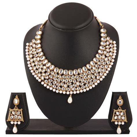 Buy Zaveri Pearls Antique Gold Tone Traditional Kundan And Pearls Necklace And Earring Set