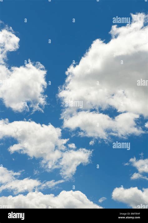 Blue skies with clouds Stock Photo - Alamy