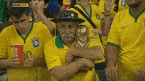 Brazil World Cup Fan Hugging The Trophy WiffleGif