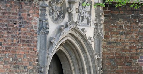 historic gothic church door architecture  stock photo