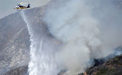 Wildfire Threatens Homes Prompts Evacuations In Pacific Palisades