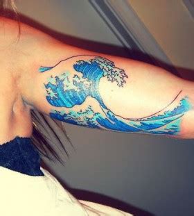 Blue adorable wave tattoo