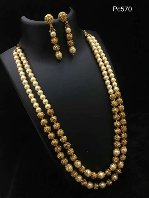 Pin By Pooja Gowda On Heavy Jewelry Pearl Jewelry Sets Gold Bride