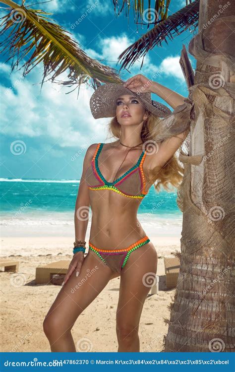 Beautiful Bikini Woman Posing On The Caribbean Beach Stock Photo