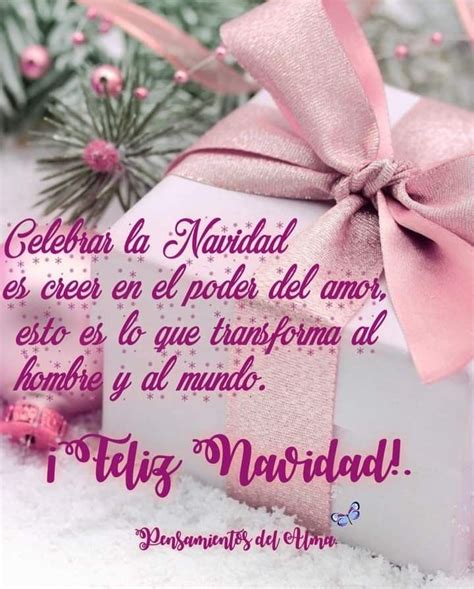 A Pink Bow On Top Of A White Present Box With The Words Happy Navidad