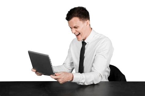 Premium Photo | Happy caucasian businessman holds a laptop