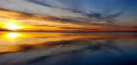 Sunset At Pebble Beach Lake Sakakawea Skyspy Photos Images Video