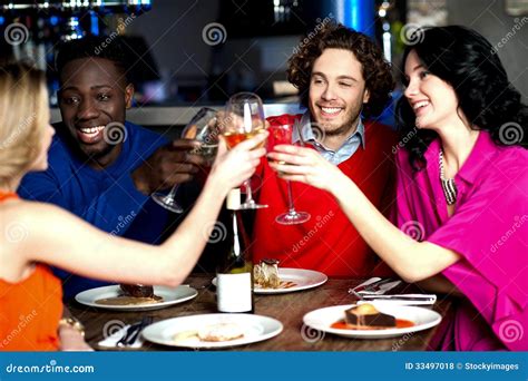 Lets celebrate...Cheers! stock photo. Image of conversation - 33497018