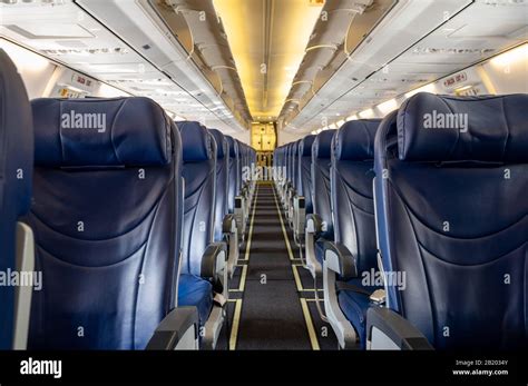 Empty interior of Boeing 737 narrow body passenger aircraft Stock Photo ...