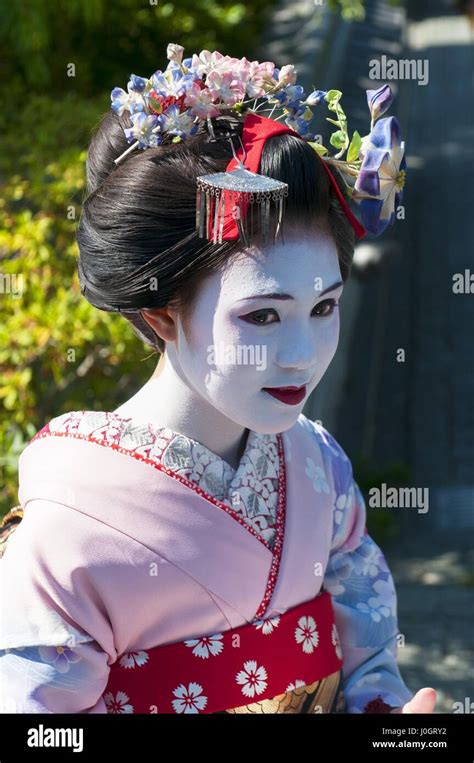 Young Beautiful Japanese Women Called Maiko Wear A Traditional Dress