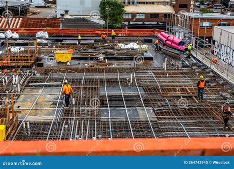 Construction Workers on a Construction Site Editorial Image - Image of building, development ...