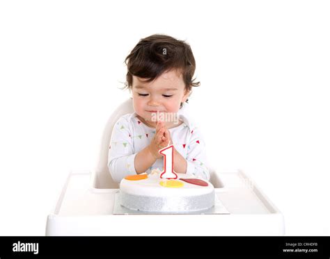 Baby eating birthday cake hands hi-res stock photography and images - Alamy