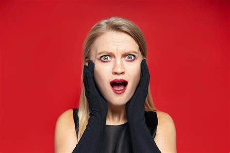 Premium Photo Concept Of Halloween Young Woman On Red Background