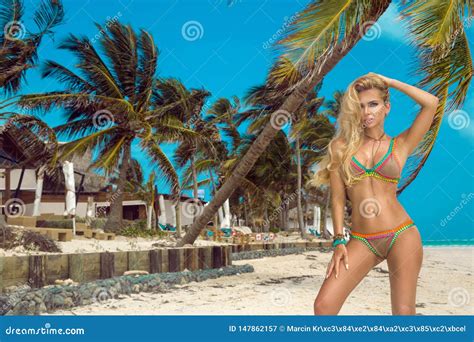 Beautiful Bikini Woman Posing On The Caribbean Beach