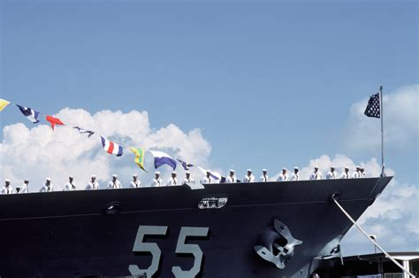 Crew Members Man The Rail At The Commissioning Ceremonies Of The Guided