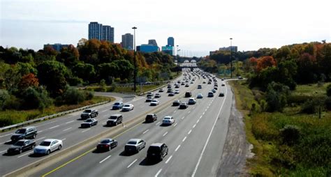 day traffic on the 6 lane Don Valley Parkway Highway in Toronto ...