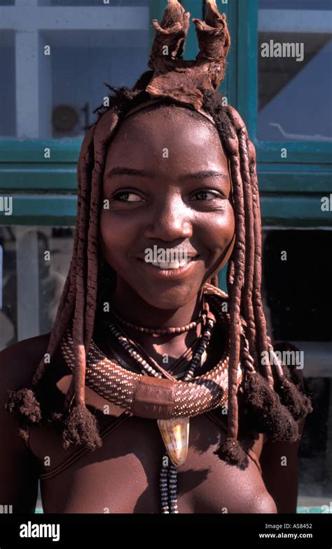 Teenage Himba Girl Showing Her Distinctive Hair Decoration And Tribal