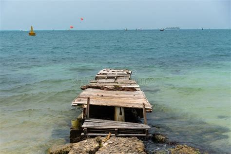 Deteriorated Pier On A Colombian Caribbean Beach Stock Photo Image