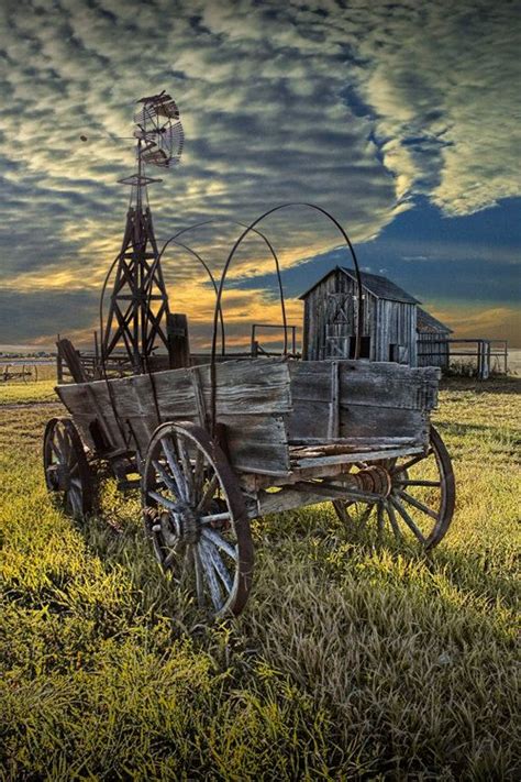 Covered Wagon Windmill And Barn On The Prairie In Town Frontier