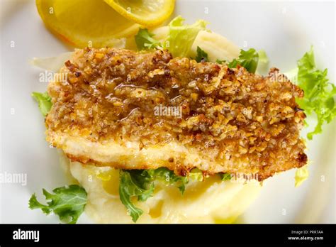 Baked Cod Fish With Mashed Potato Stock Photo Alamy