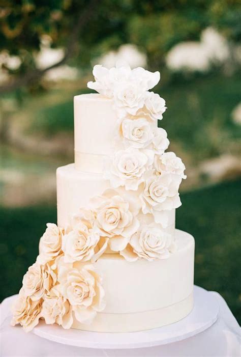 Simply Elegant Off White Three Tier Wedding Cake Wrapped With Sugar