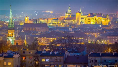 Krakow City Skyline With The Wawel Royal Castle In Background At Dusk