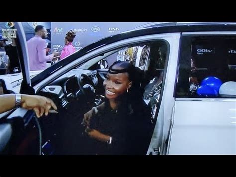 PRIZE GIVING ILEBAYE RECEIVES HER BRAND NEW SUV 120M NAIRA CHEQUE